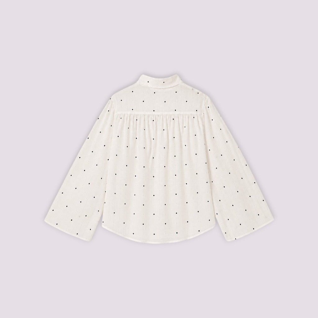 Chemise Sirlab écrue à pois noirs, coupe ample avec manches larges et détails transparents, vue de dos.